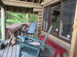 front porch has picnic table, 2 rocking chairs and loveseat